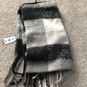 Black and white plaid scarf. One size fits all.